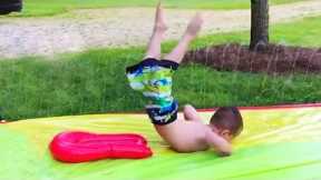 Funny Baby Playing Slide Water - Baby Outdoor Moments
