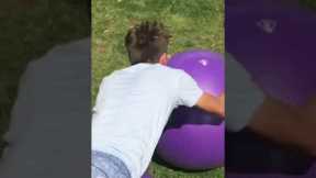 Australian Man Breaks Swiss Ball Rolling Record!