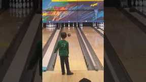 Kid makes impossible bowling trick shot look easy!