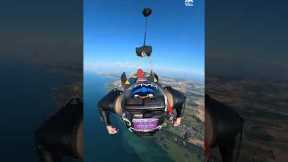 Group of Skydivers Fly Over Beautiful Landscape | People Are Awesome