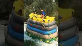 Guy Rides Tower of Rafts Along Rapids | People Are Awesome