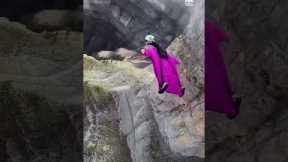 Wingsuit Jump Through Mountain Pass | People Are Awesome