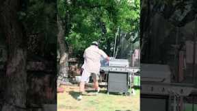 Guy Punts Rugby Ball Into Backyard Barbecue Grill