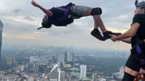 INSANE FLIPS!!! KL Tower  BASE Jumping 23'